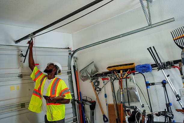 Professional Garage Door Roller Replacement technician working in Lake Fenton, MI